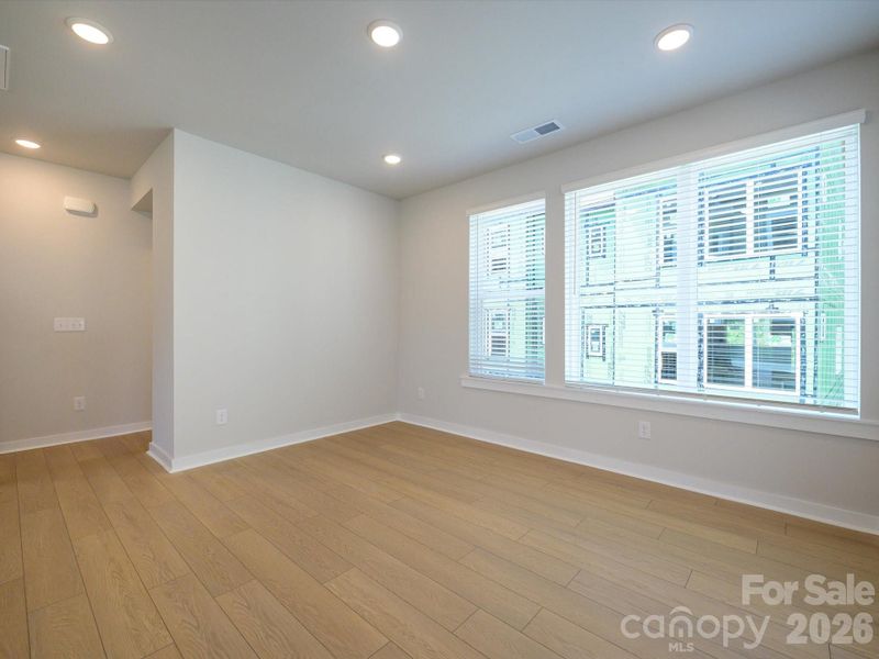 Spacious, unfurnished interior of a new home in Central Living at Craig, Charlotte (Image 13).