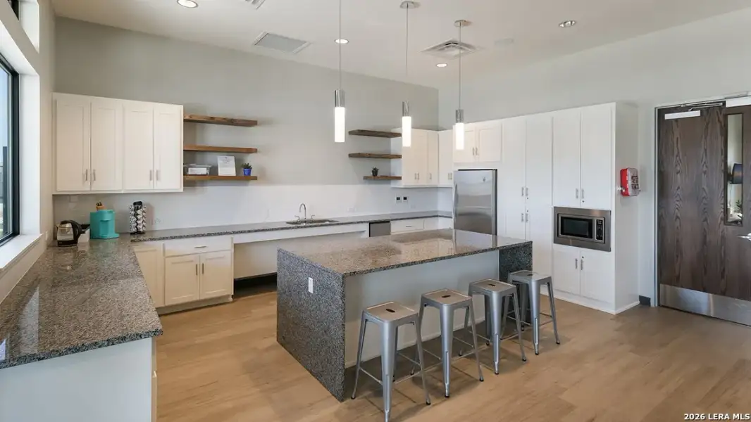 Furnished interior view inside a new home in Riverstone at Westpointe, San Antonio (Image 3).