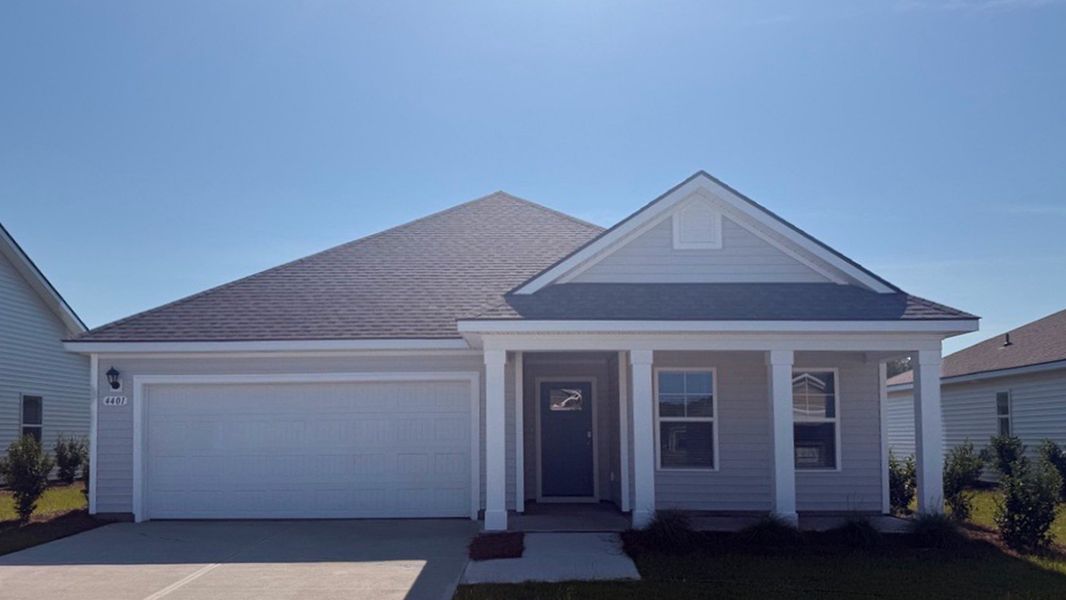 Representative exterior photo of a completed home built from the Aria by D.R. Horton in The Meadows at Wildwood Village, Shallotte, NC (Image 10). Representative exterior photo of a completed home built from the Aria by D.R. Horton in The Meadows at Wildwood Village, Shallotte, NC (Image 10).