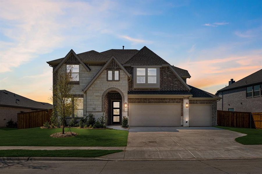 Front exterior of a new home in Waterscape Classic 60s, Royse City, TX, highlighting curb appeal (Image 2). Front exterior of a new home in Waterscape Classic 60s, Royse City, TX, highlighting curb appeal (Image 2).