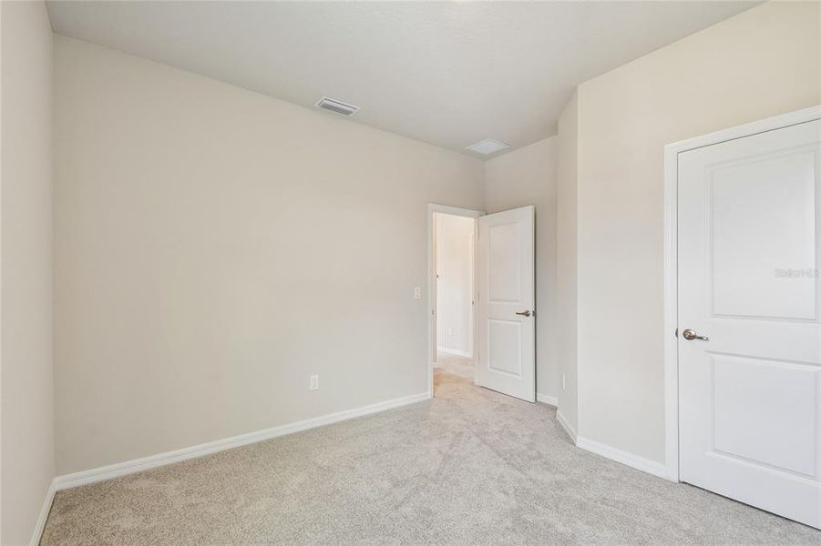 Spacious, unfurnished interior of a new home in Oakfield at Mount Dora Cottage Series, Mount Dora (Image 34).