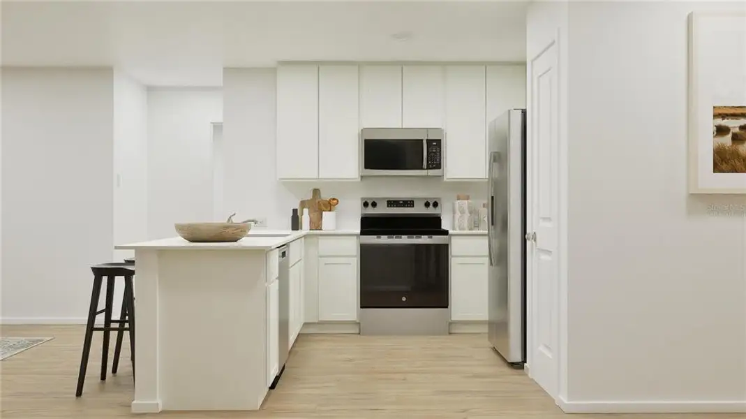 Furnished interior view inside a new home in , Kissimmee (Image 3).