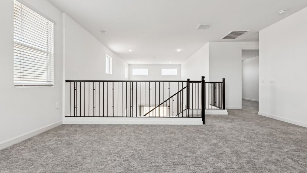 Representative unfurnished interior of a home built from the Phoenician by D.R. Horton in The Ridge at Stone Butte, Phoenix (Image 25). Representative unfurnished interior of a home built from the Phoenician by D.R. Horton in The Ridge at Stone Butte, Phoenix (Image 25).