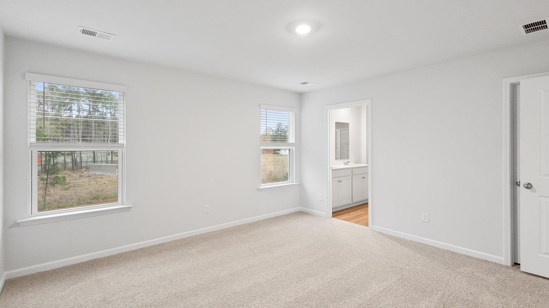 Spacious, unfurnished interior of a new home in Pine Hills at Cane Bay, Summerville (Image 13).