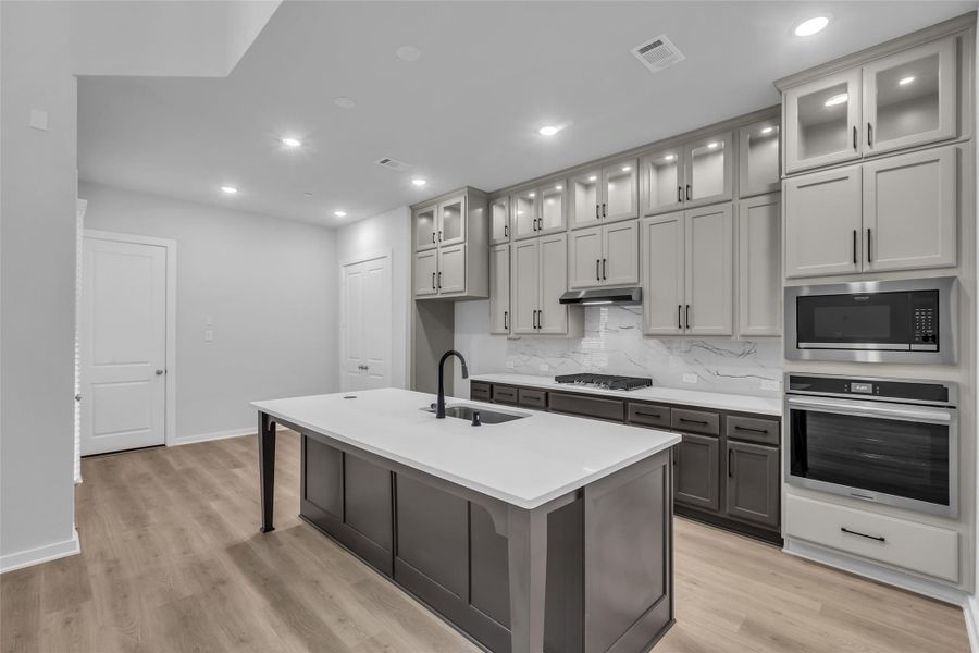 42" cabinetry and a large island.