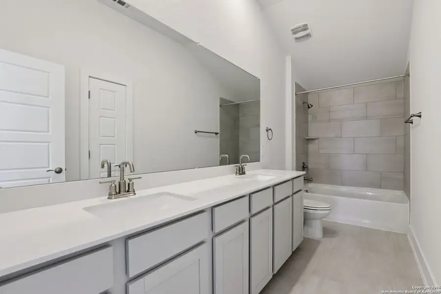 Furnished interior view inside a new home in Carmel Ranch, Schertz (Image 11).