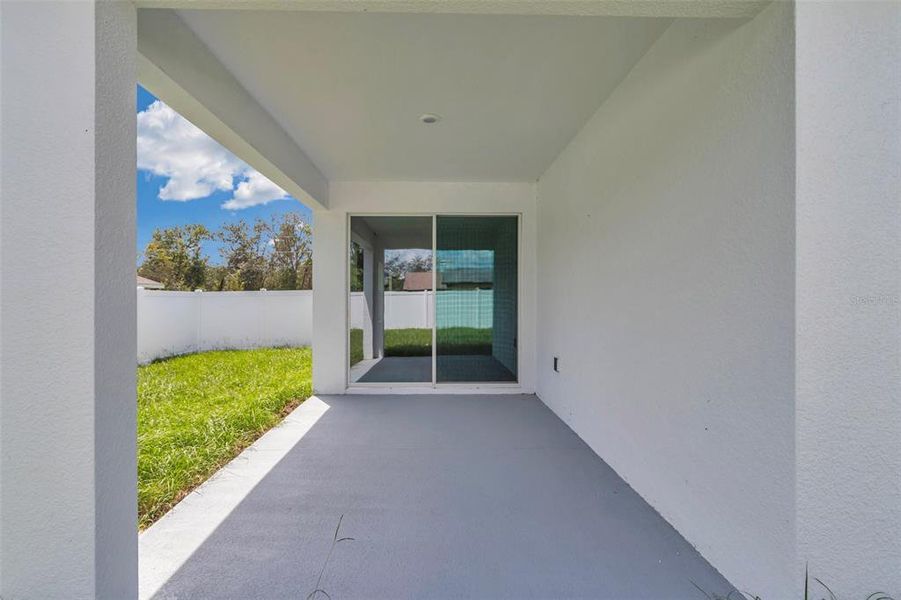 Exterior details and patio area of a home in , Summerfield (Image 23).