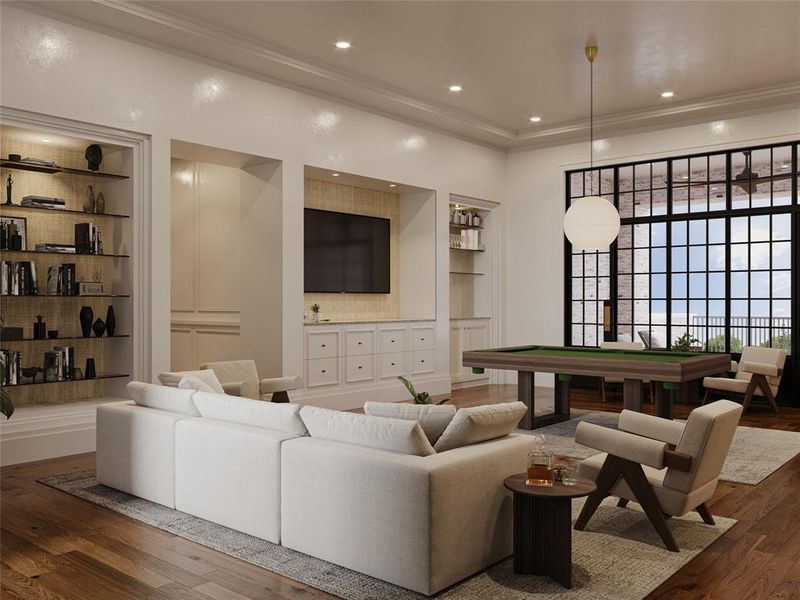 *Virtual Rendering* The game room is located off of the backstair case a features a dry bar, built-in shelving, a built-in media center, and access to the outdoor patio.