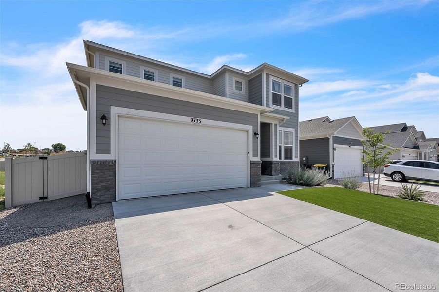 Front exterior of a new home in , Fountain, CO, highlighting curb appeal (Image 30).
