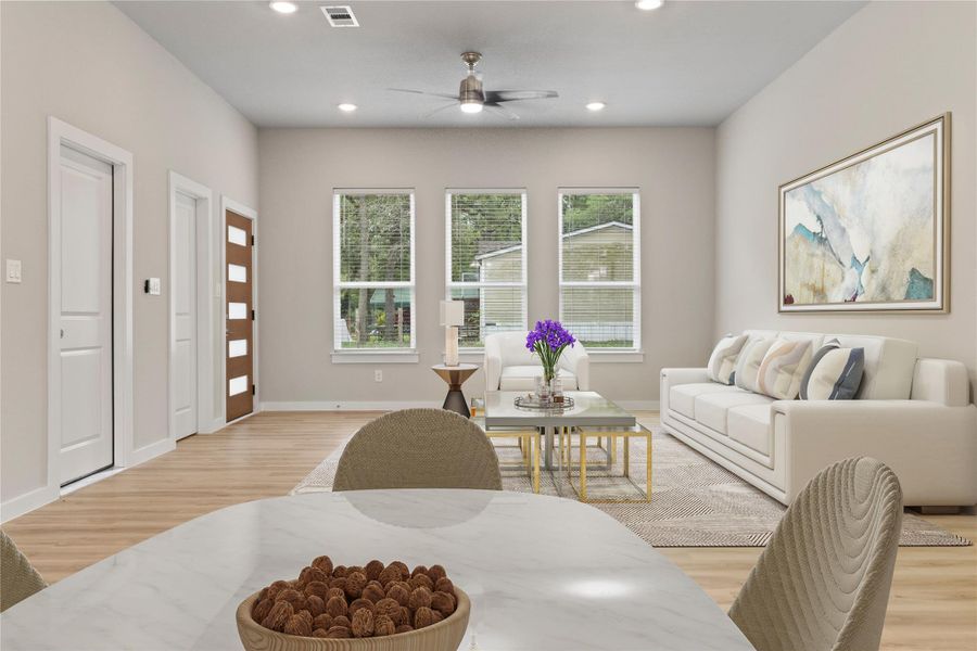 A stunning dining and living area bathed in natural light—perfect for making it your new home! (virtually staged) A stunning dining and living area bathed in natural light—perfect for making it your new home! (virtually staged)