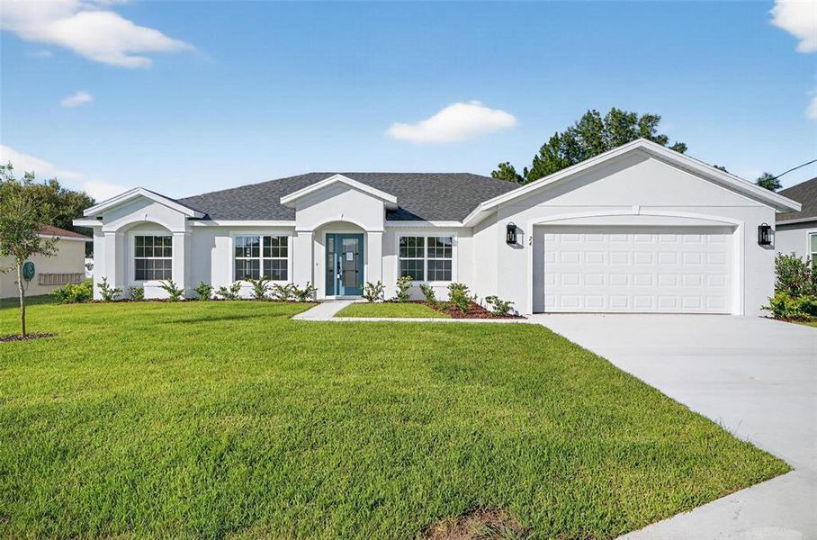 Front exterior of a new home in , Palm Coast, FL, highlighting curb appeal (Image 24).