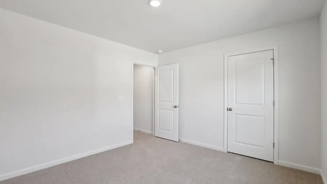 Spacious, unfurnished interior of a new home in The Landing at Winston Pointe, Clayton (Image 28). Spacious, unfurnished interior of a new home in The Landing at Winston Pointe, Clayton (Image 28).