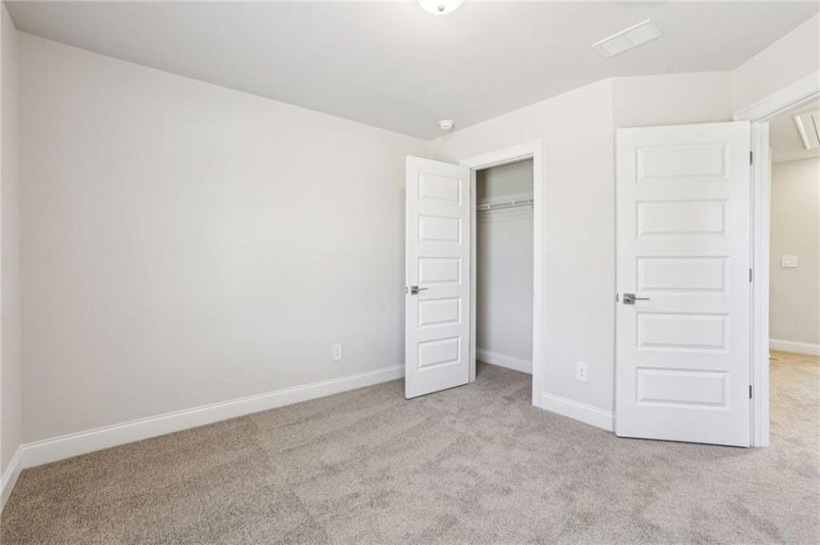 Spacious, unfurnished interior of a new home in Hemingway - Highland Series, Cumming (Image 32).