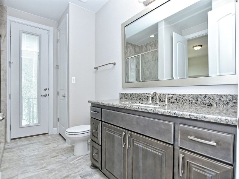 Representative furnished interior of a home built from the Coronado I by Giddens Homes in Clearwater Ranch, Liberty Hill (Image 7).