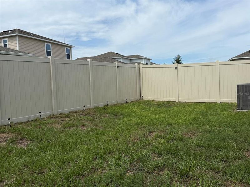 Exterior details and patio area of a home in Marion Creek, Haines City (Image 26).