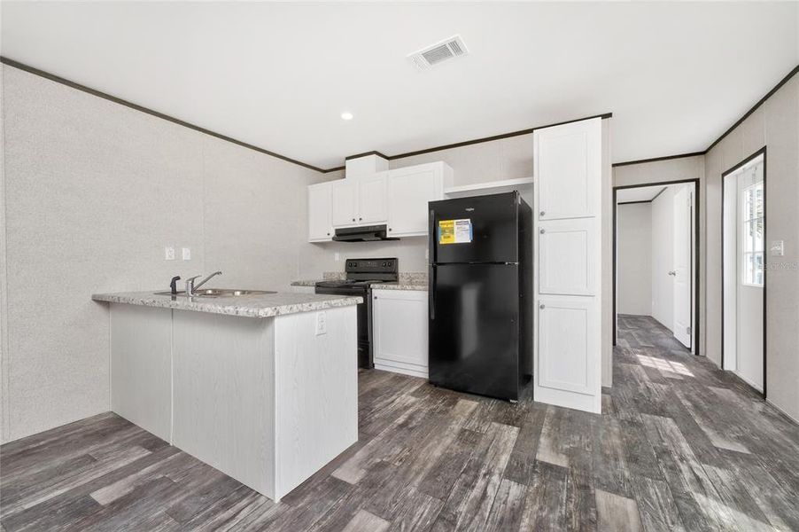 Furnished interior view inside a new home in , Port Charlotte (Image 3).