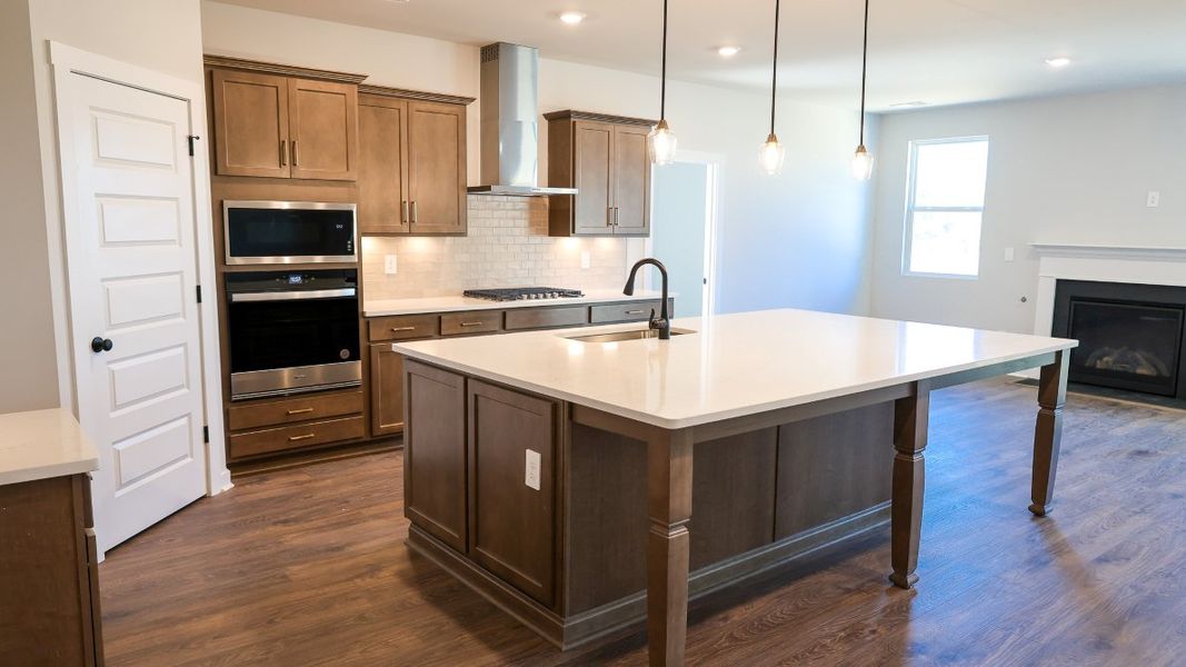 Representative furnished interior of a home built from the TISDALE by D.R. Horton in Harvest Point, Spring Hill (Image 12).