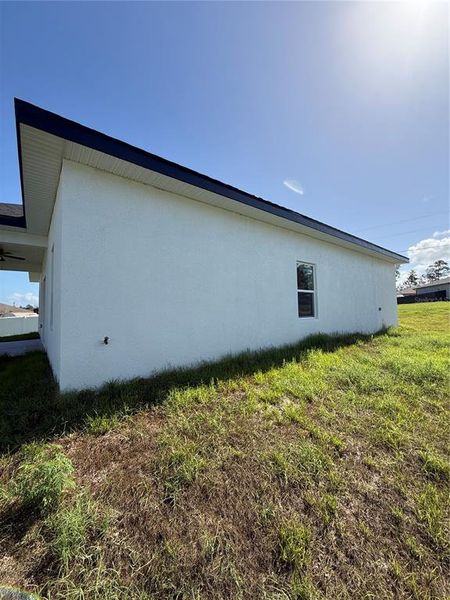 Exterior details and patio area of a home in , Ocala (Image 4).