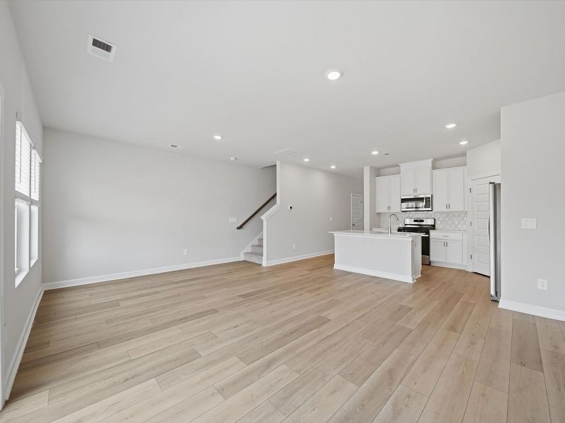 Spacious, unfurnished interior of a new home in Crossing at Abner Creek Townes, Greer (Image 13).
