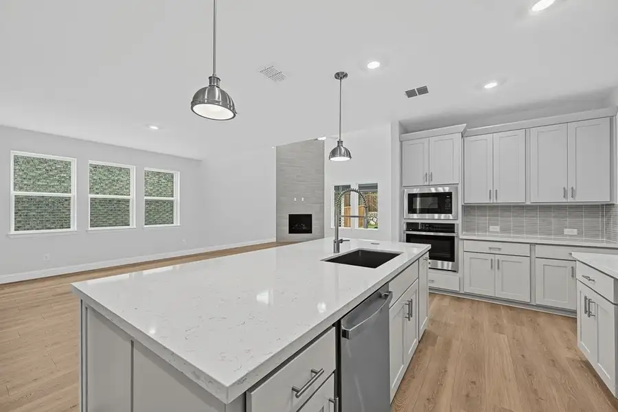 Furnished interior view inside a new home in South Oak, Lakewood Village (Image 8).