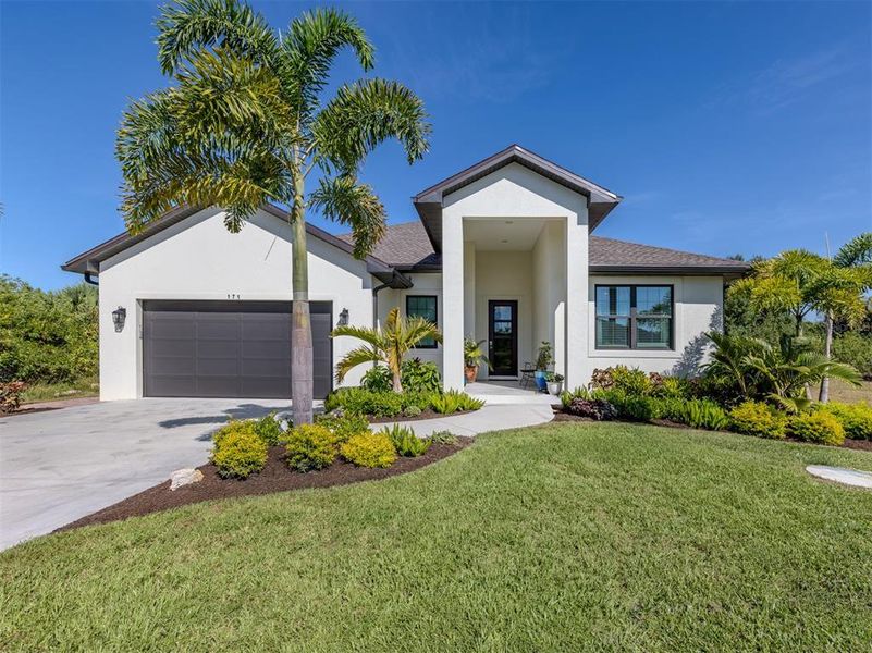 Front exterior of a new home in , Rotonda West, FL, highlighting curb appeal (Image 20).