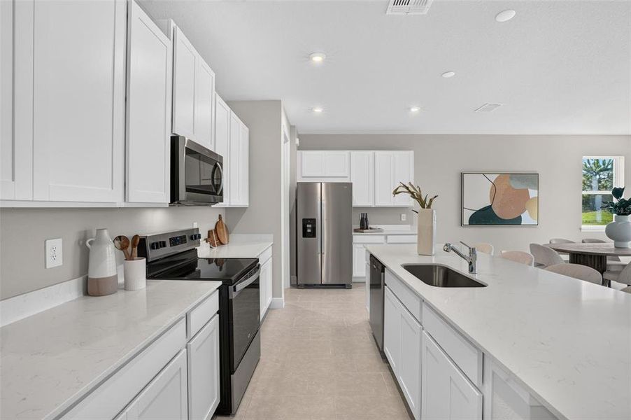 Furnished interior view inside a new home in Windwater, Parrish (Image 6).
