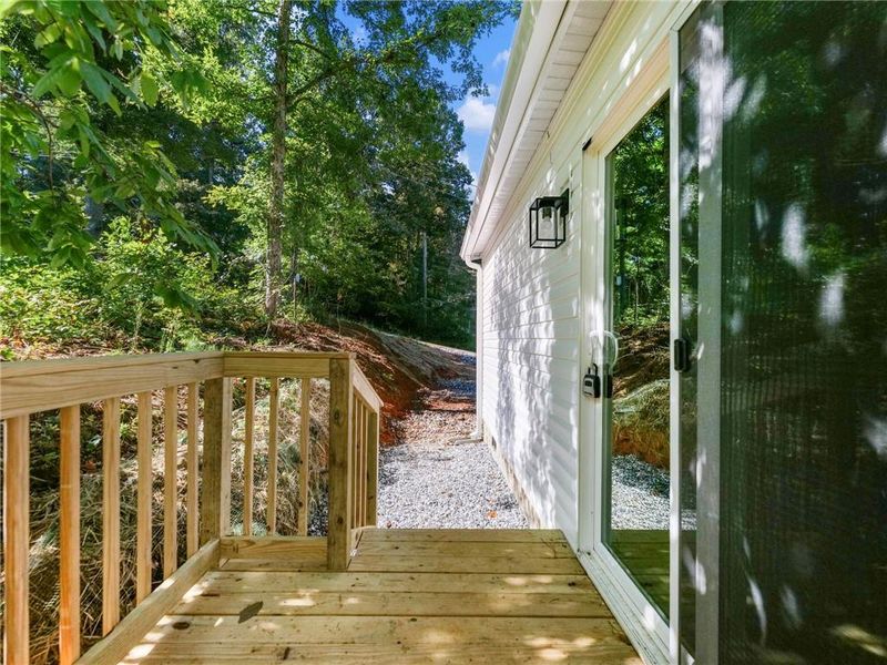Exterior details and patio area of a home in , Clarkesville (Image 26).