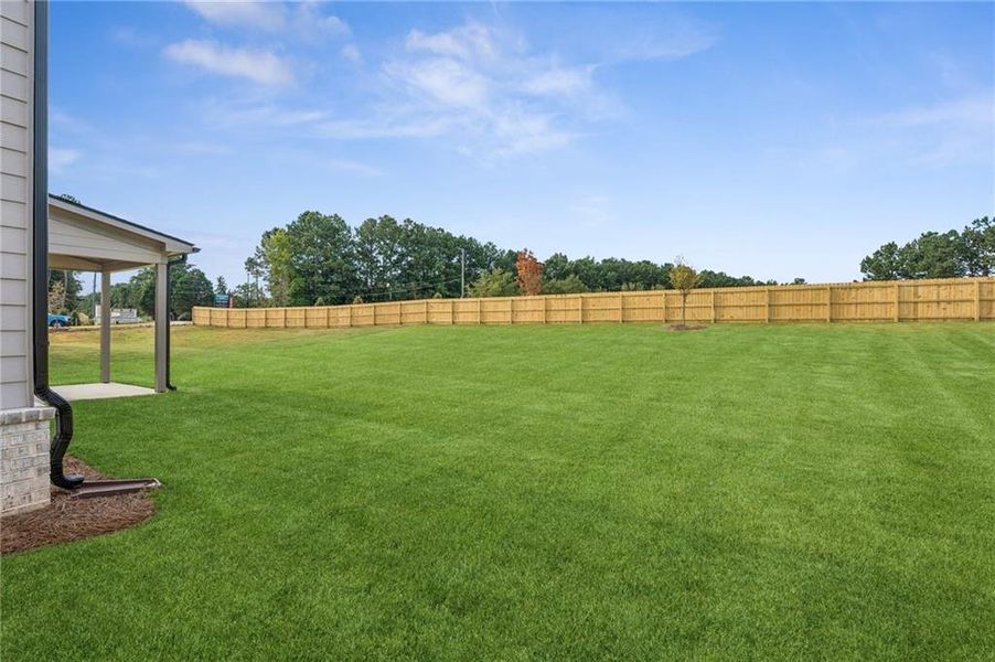 Front exterior of a new home in , Lawrenceville, GA, highlighting curb appeal (Image 23).