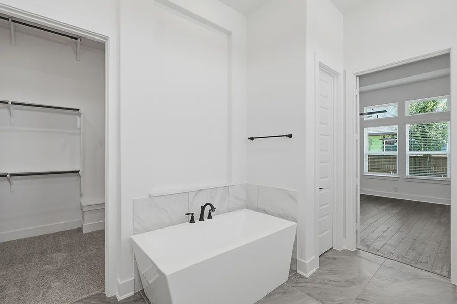 Representative furnished interior of a home built from the Kingston by Chesmar Homes in Prominence 60's, San Antonio (Image 19).