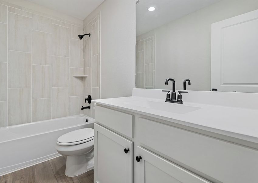 Bathroom with a shower/tub combination