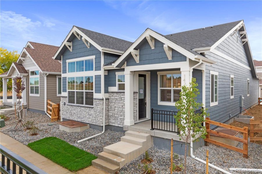 Exterior details and patio area of a home in Dillon Pointe - City, Broomfield (Image 3).