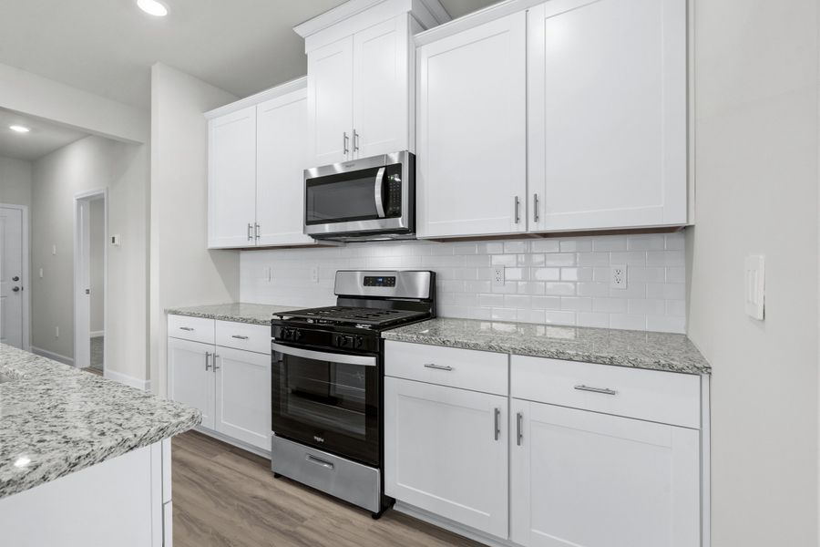 Furnished interior view inside a new home in Cypress Ridge - The Boardwalk Series, Longs (Image 7). Furnished interior view inside a new home in Cypress Ridge - The Boardwalk Series, Longs (Image 7).