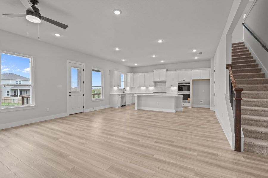 A large empty kitchen. A large empty kitchen.