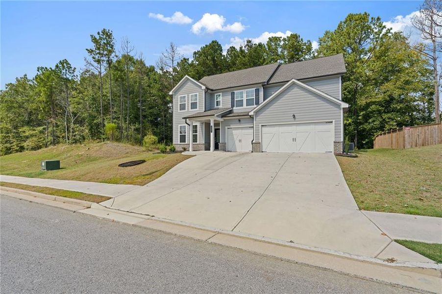 Front exterior of a new home in , Dallas, GA, highlighting curb appeal (Image 30).