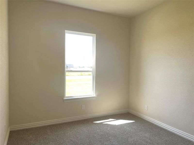 Spacious, unfurnished interior of a new home in The Ranch at Stone Hill, Waxahachie (Image 11).