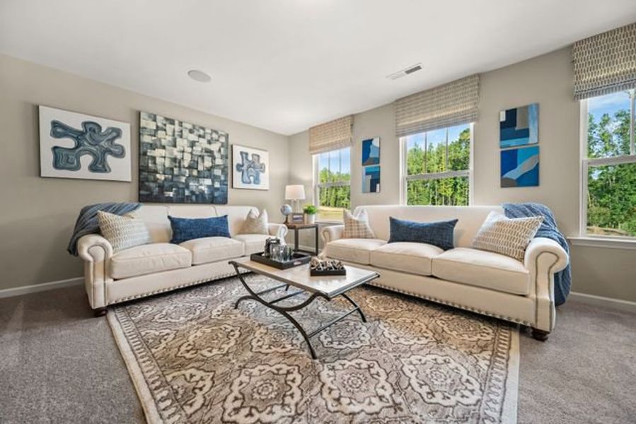 Representative furnished interior of a home built from the Kipling by True Homes in Whispering Hills, Locust (Image 13).