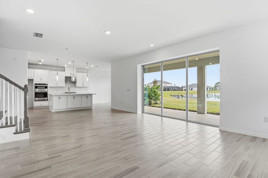Representative unfurnished interior of a home built from the Barbados by Taylor Morrison in Ardisia Park, New Smyrna Beach (Image 32).