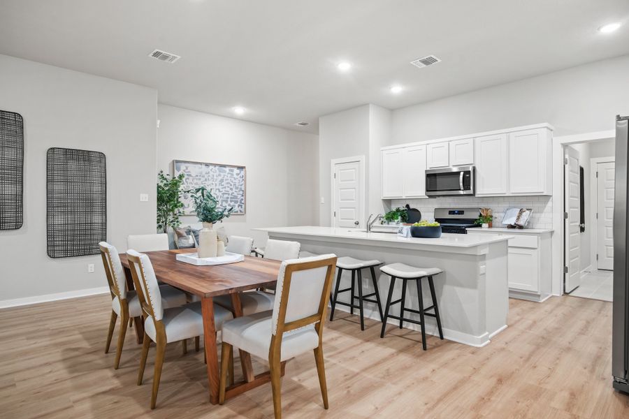 Dining Room in the Diamond home plan by Trophy Signature Homes – REPRESENTATIVE PHOTO