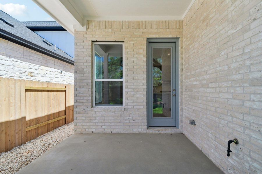 Exterior details and patio area of a home in Persimmon, Buda (Image 3).