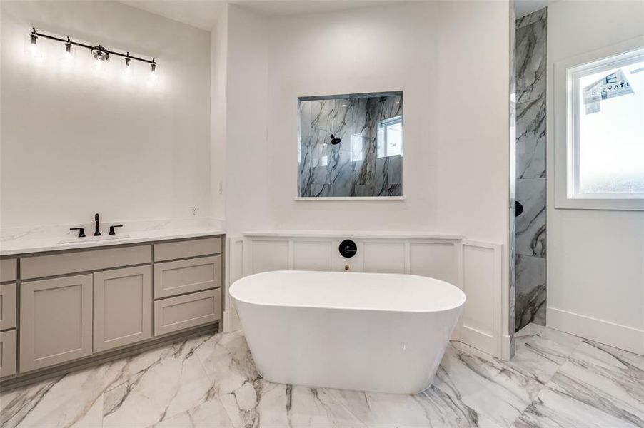 View of primary bathroom. View of primary bathroom.