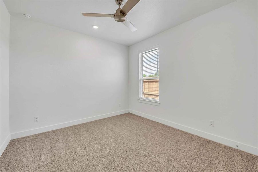 Spare room featuring recessed lighting, baseboards, light colored carpet, and ceiling fan Spare room featuring recessed lighting, baseboards, light colored carpet, and ceiling fan