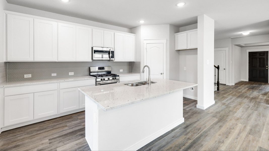 Representative furnished interior of a home built from the Meyerson by Brightland Homes in Sunterra, Katy (Image 6).