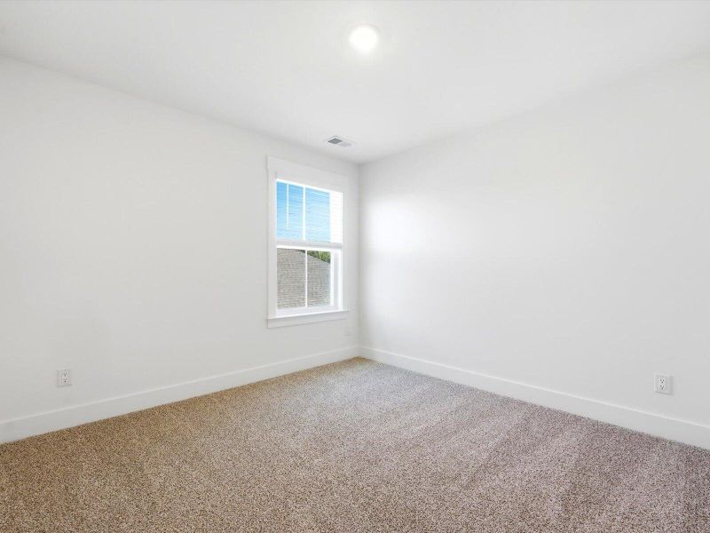 Spacious, unfurnished interior of a new home in The Coves at Lakes of Cane Bay II, Summerville (Image 24). Spacious, unfurnished interior of a new home in The Coves at Lakes of Cane Bay II, Summerville (Image 24).