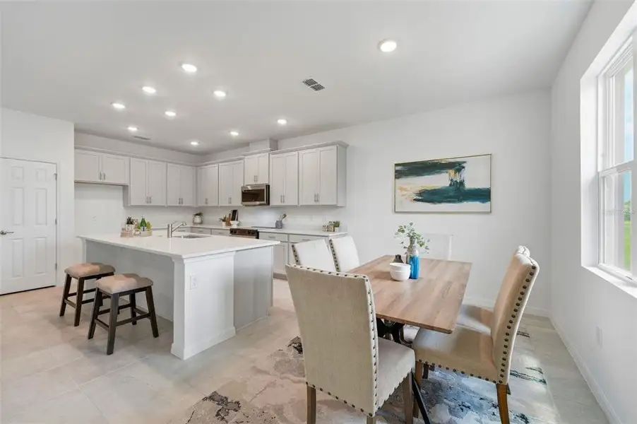 Furnished interior view inside a new home in Trinity Place, St. Cloud (Image 12).