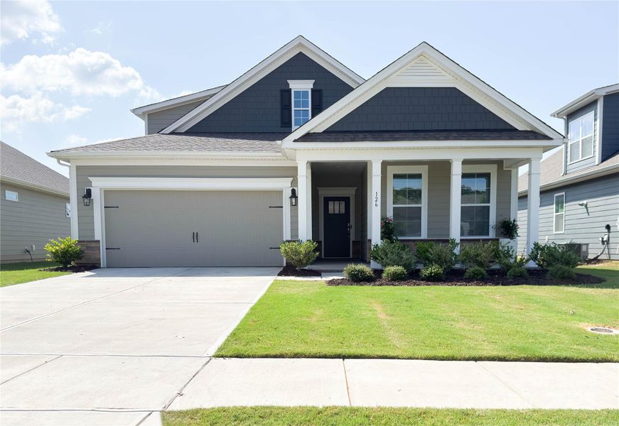 Front exterior of a new home in Brookside, Troutman, NC, highlighting curb appeal (Image 2).