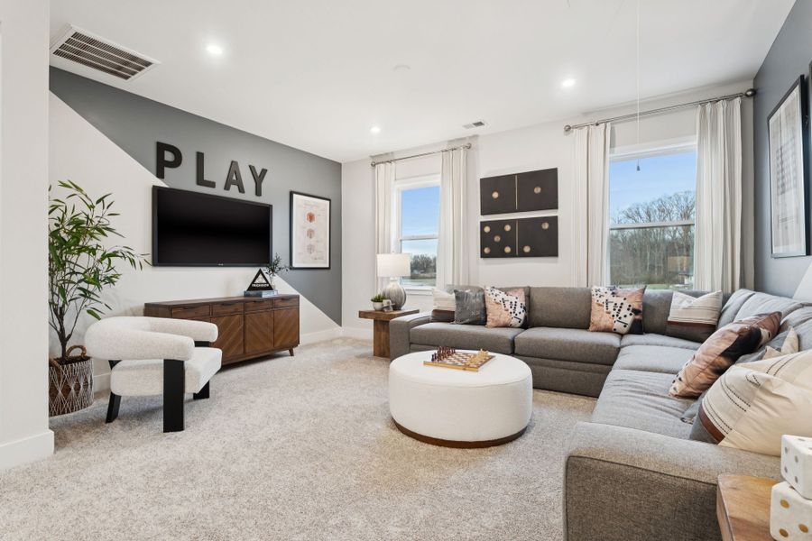 A living room with a fireplace.