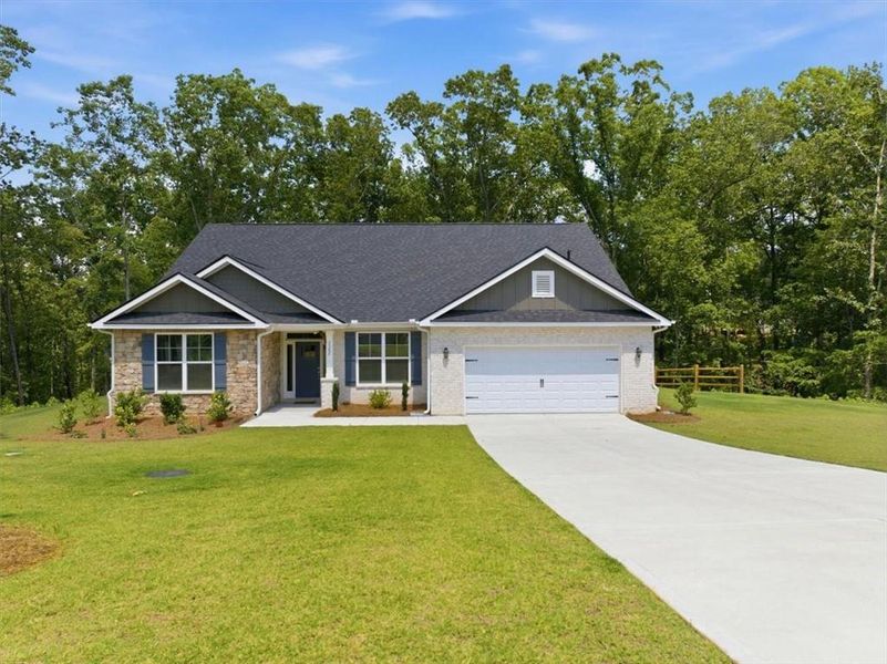 Front exterior of a new home in Tuscany Hills, Douglasville, GA, highlighting curb appeal (Image 2). Front exterior of a new home in Tuscany Hills, Douglasville, GA, highlighting curb appeal (Image 2).