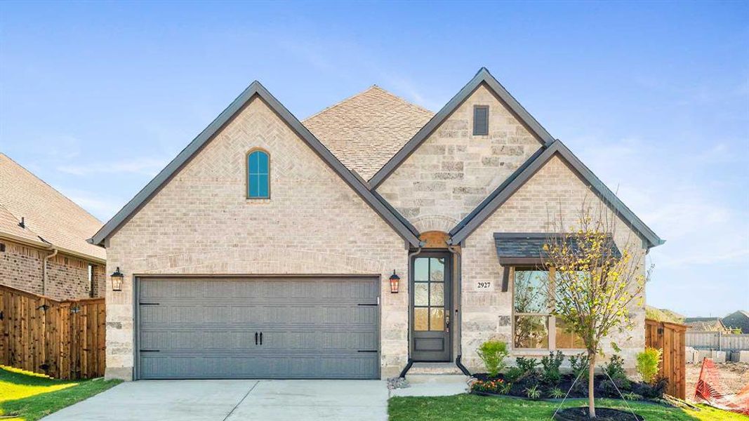 Front exterior of a new home in Devonshire - Reserve 45', Forney, TX, highlighting curb appeal (Image 1). Front exterior of a new home in Devonshire - Reserve 45', Forney, TX, highlighting curb appeal (Image 1).