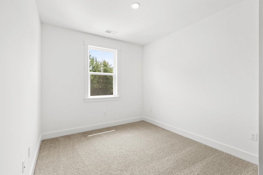 Spacious, unfurnished interior of a new home in Long Bay Golf Club, Longs (Image 34).