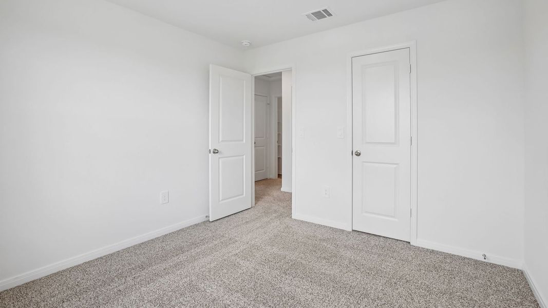 Spacious, unfurnished interior of a new home in Prairie Lakes, Buda (Image 40).